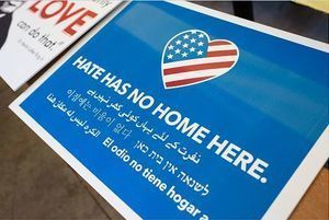 Lawn sign reads Hate Has No Home Here