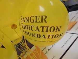 Yellow Balloon that reads "Sanger Education Foundation A Child's Tomorrow Begins Today"
