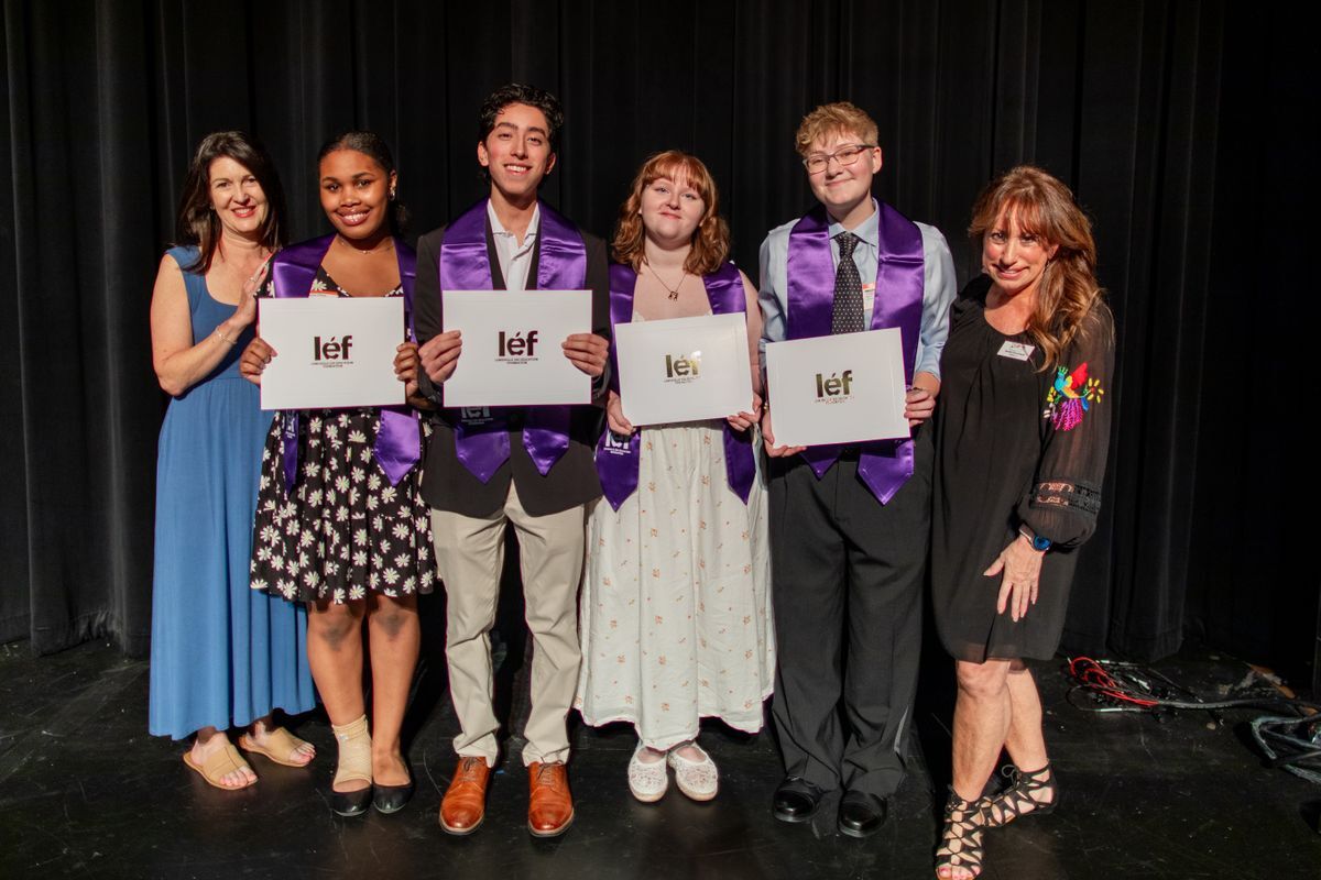 four student recipients with donors