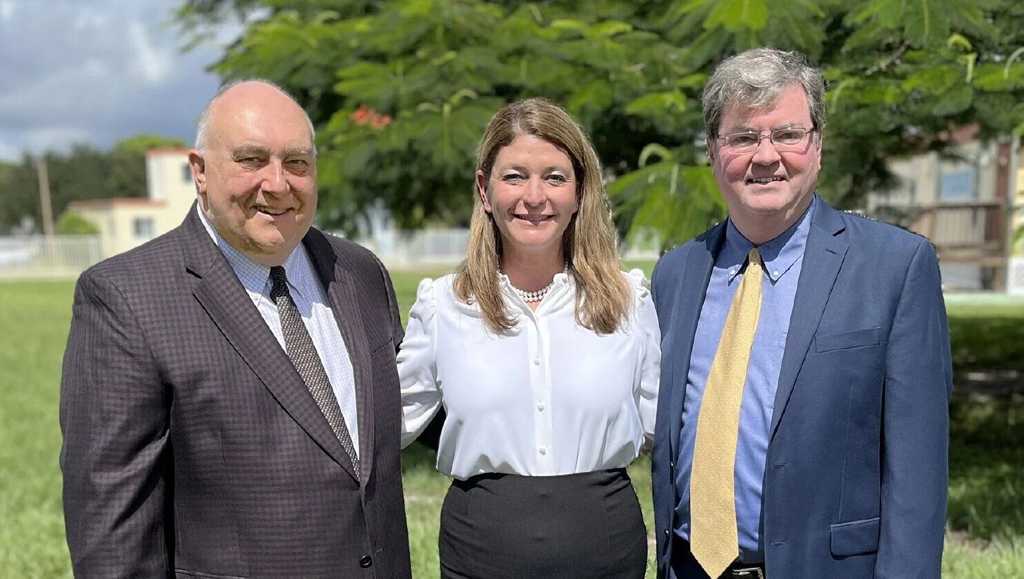 Gary Gelo, current superintendent of schools for the Diocese of Palm Beach, left, with Katie Kervi, assistant superintendent who will take on the superintendent's role when Gelo retires in February 2026, and John Clarke, associate superintendent.