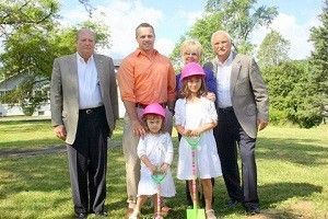 A family at the ground breaking ceremony.