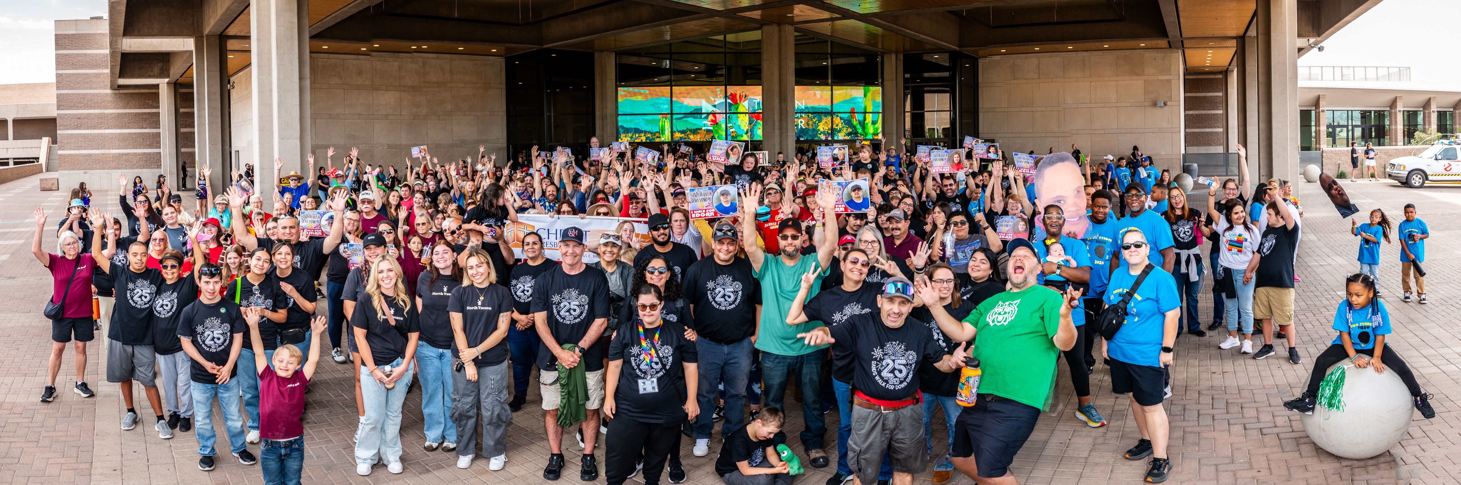 Large crowd of people supporting Down Syndrome.