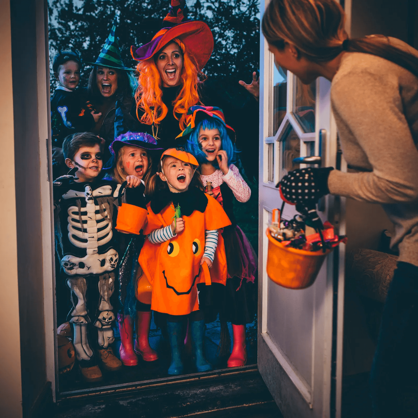 Children in Halloween costumes trick or Treating