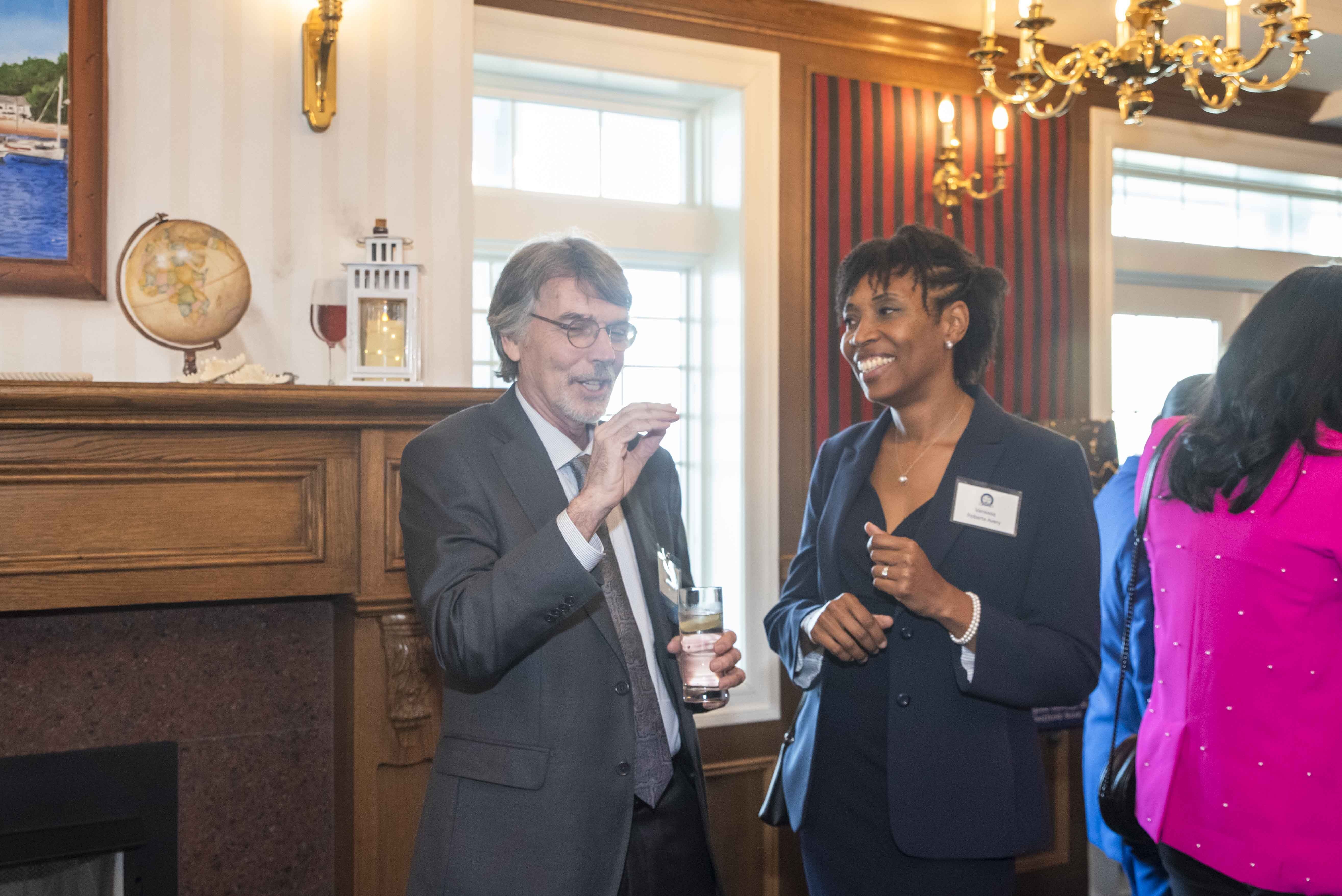 Fellows members Bill Logue and Vanessa Avery chatting at the start of the Reception