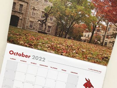Close-up of a full-color stitched calendar printed for the University of Central Missouri.
