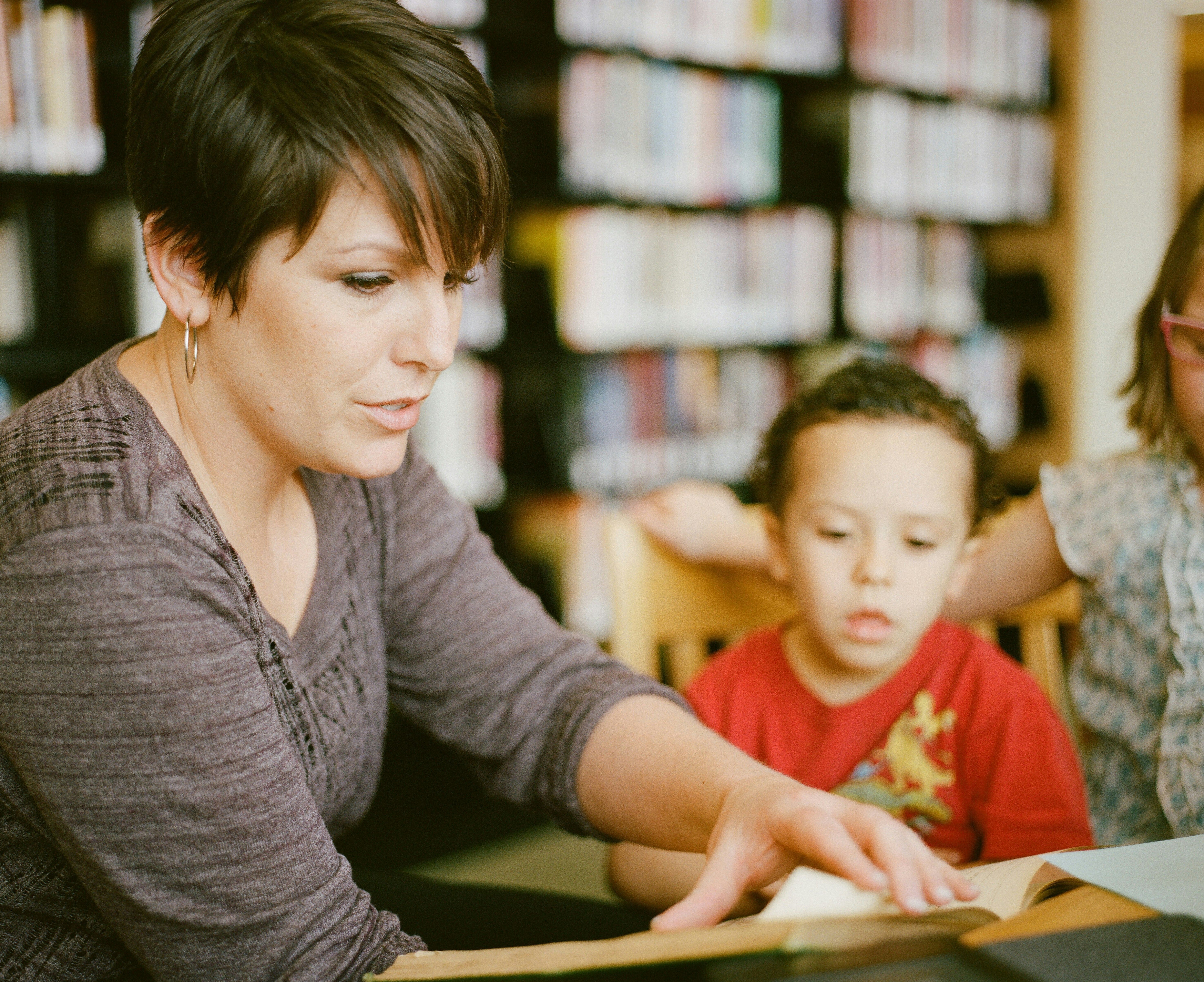 Teacher helping a student