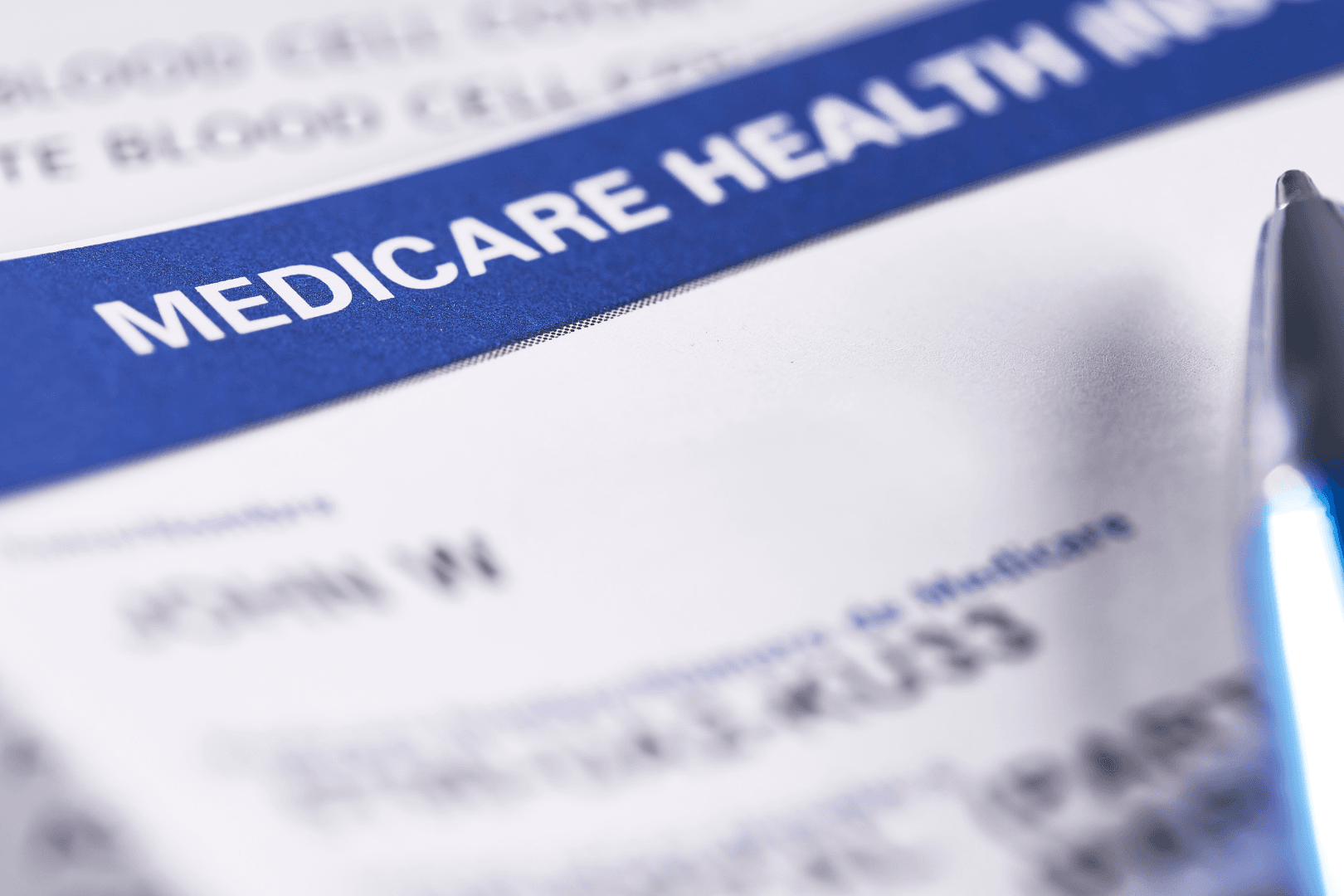 close up image of Medicare enrollment form with a blue bar and white text reading "Medicare health..."