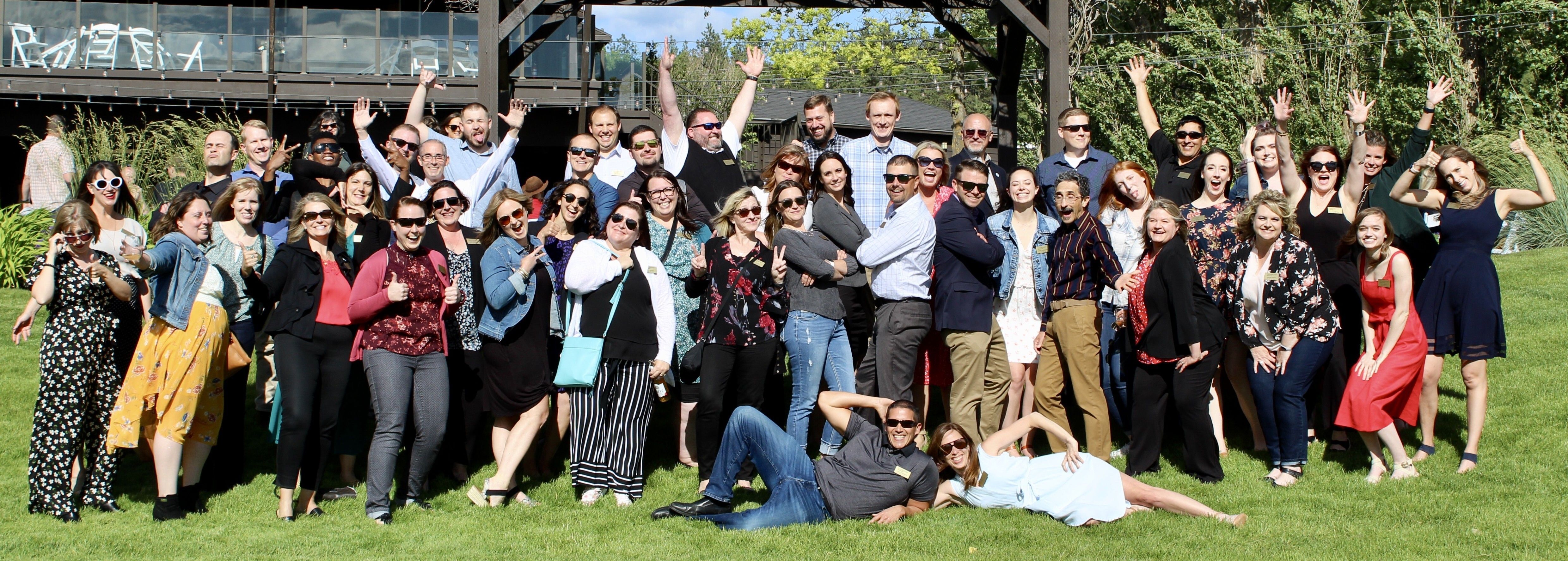 A group of people posing for a group photo