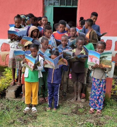 Children reading books.