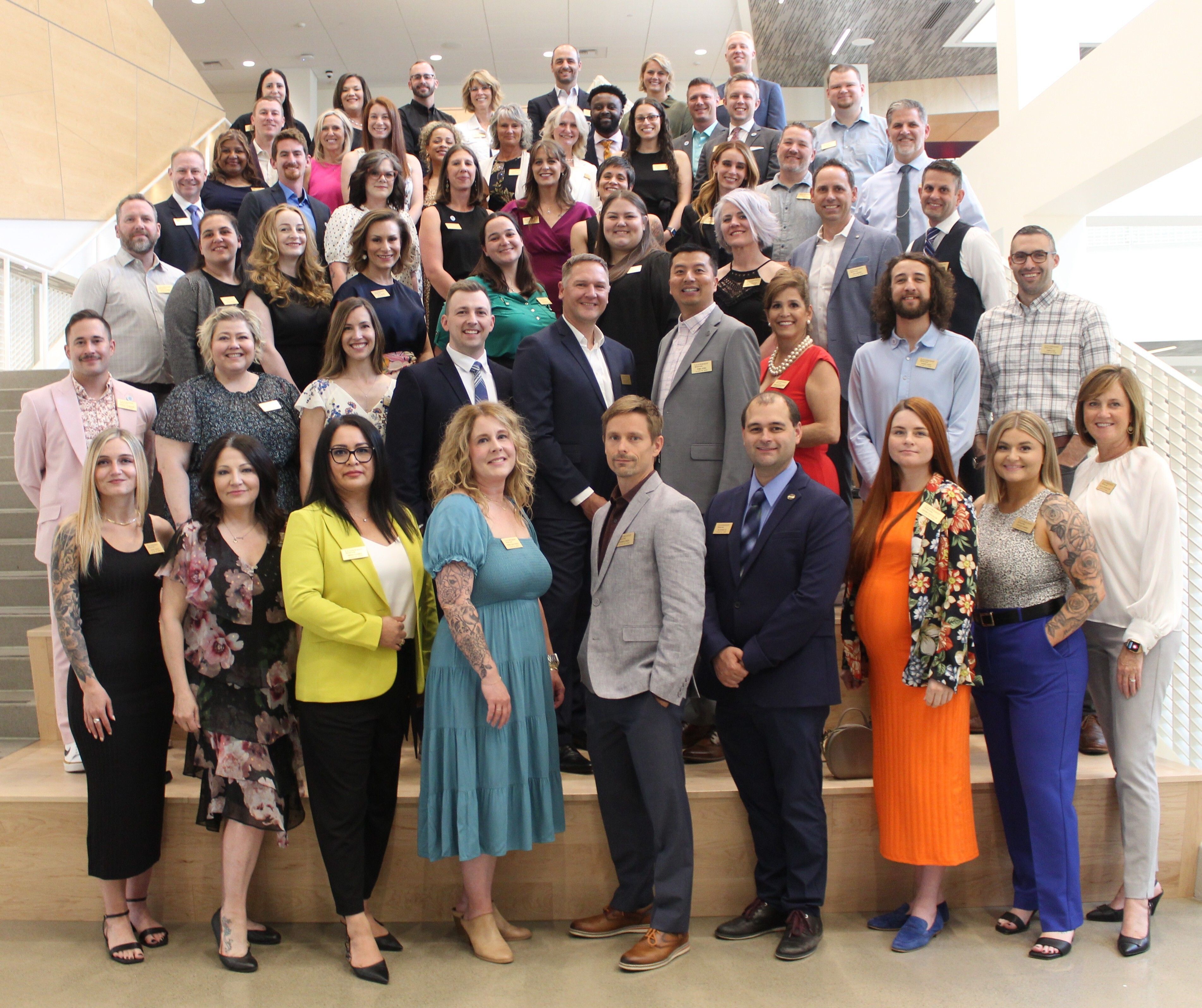 A group of people posing for a group photo