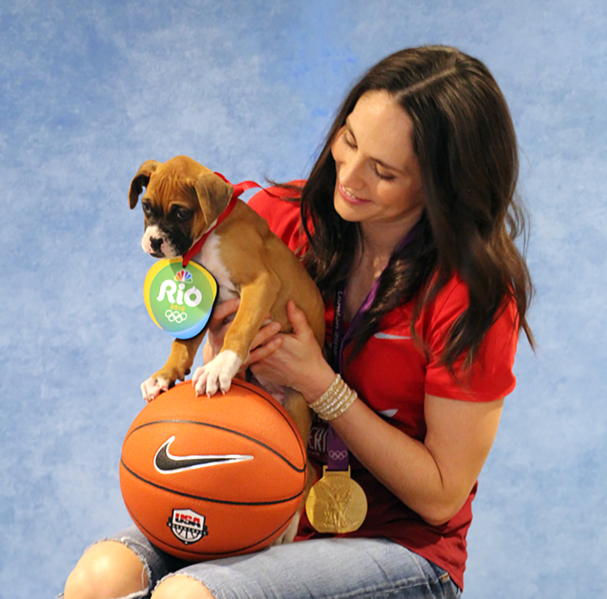 Sue and a canine friend at the Rio Olympics, summer 2016.