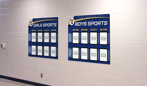 School hallway showing high school sports standing display, custom signs