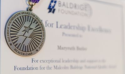 Foundation leadership award certificate and medal