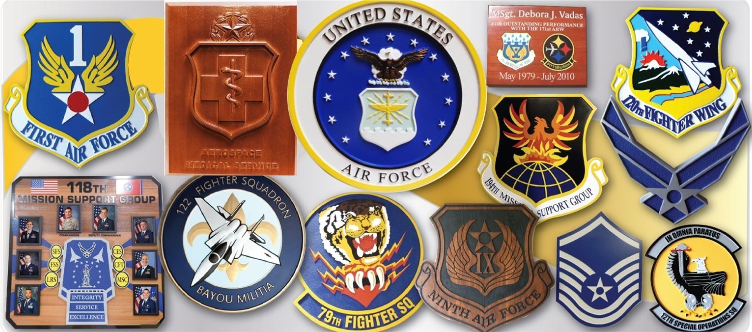 U.S. Air Force Commemorative Plaques – A diverse collection of Air Force unit and department plaques showcasing carved wood, vinyl, and painted relief styles representing wings, squadrons, and support groups.