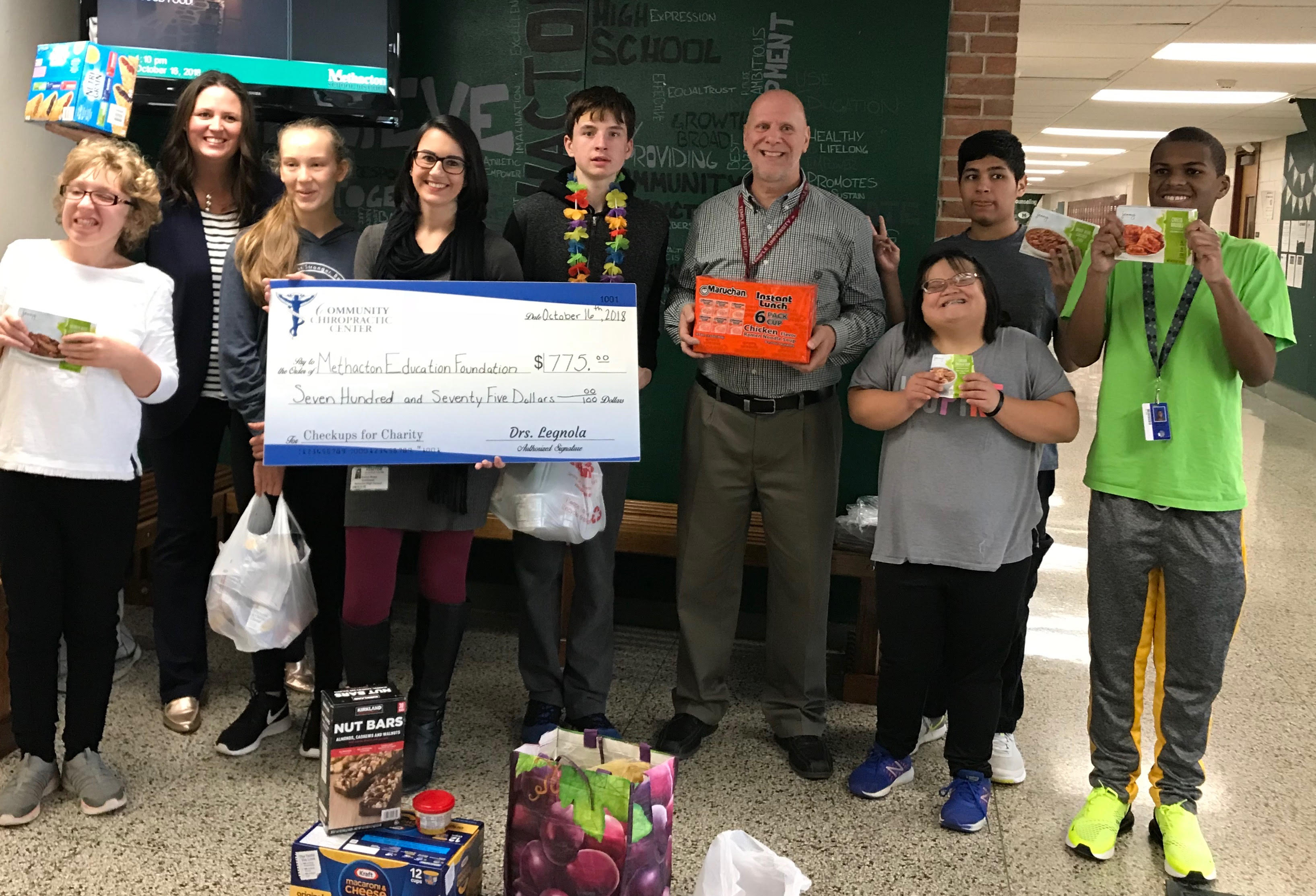 Community Chiropractic Center Donates to Backpack Program