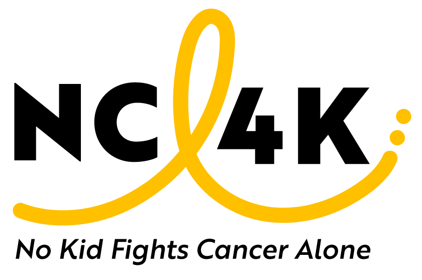 A smooth, golden-yellow line on a black background forms a looping, cursive-style ‘NC’ shape, ending with three small dots on the right.