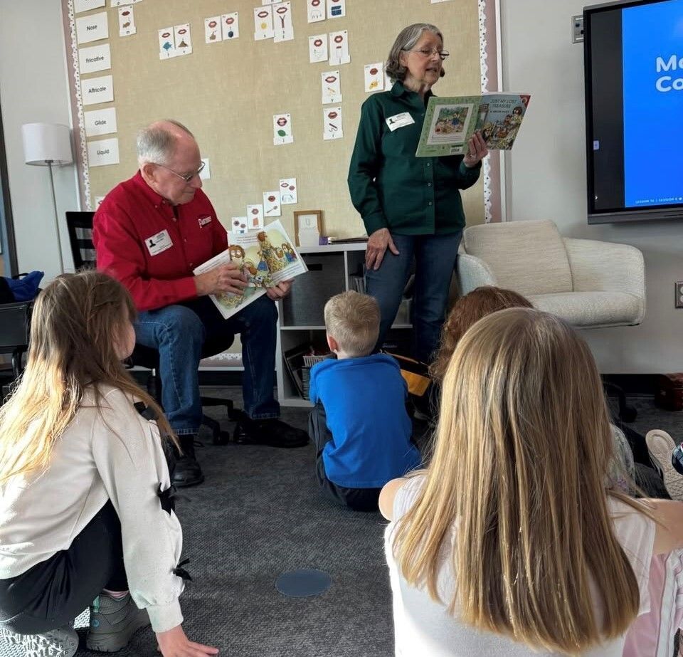 Jim & Rhonda Reading & Giving Books to Creston Kindergarteners!