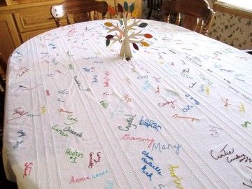 Table cloth thrifted from Goodwill covered in signatures