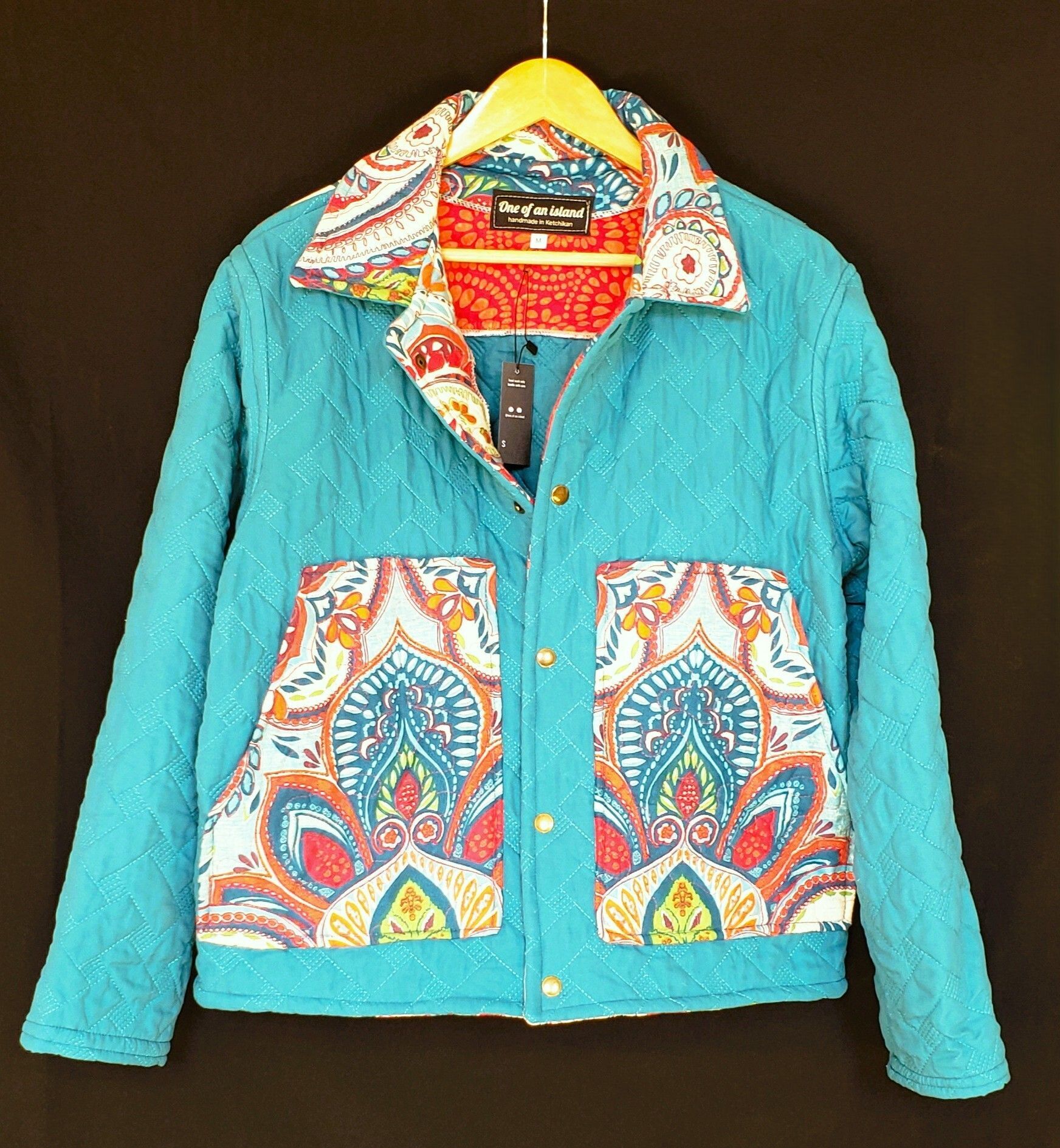 Kelsey McNeil - Teal Jacket