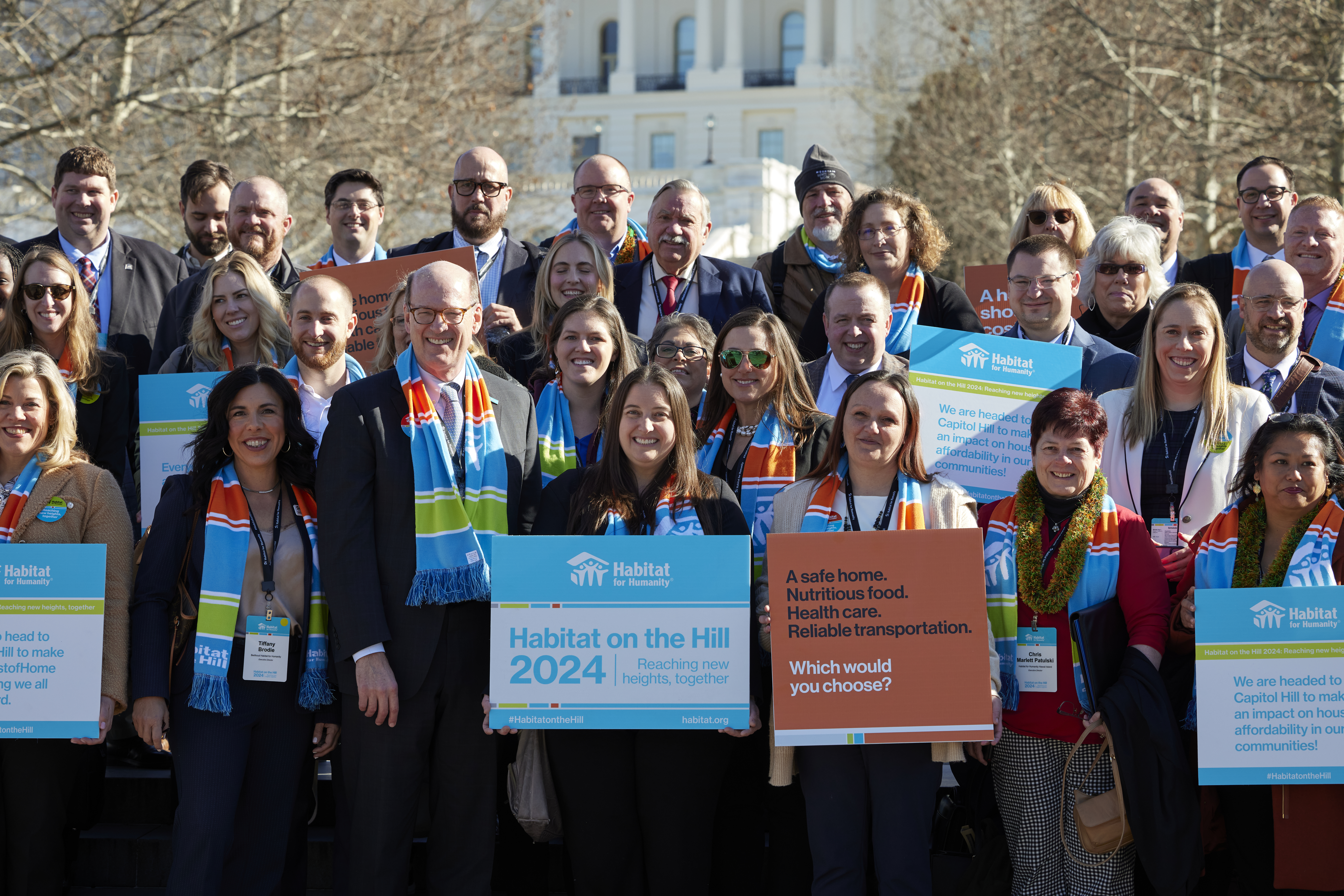 Habitat representatives stand in front of the Capitol building