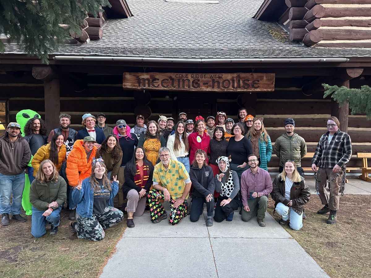[Image Description: MCC staff members stand in front of Cane Ridge West after the staff party. They are wearing Halloween costumes.]