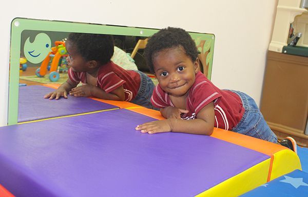 Baby playing at Playtime Project Program