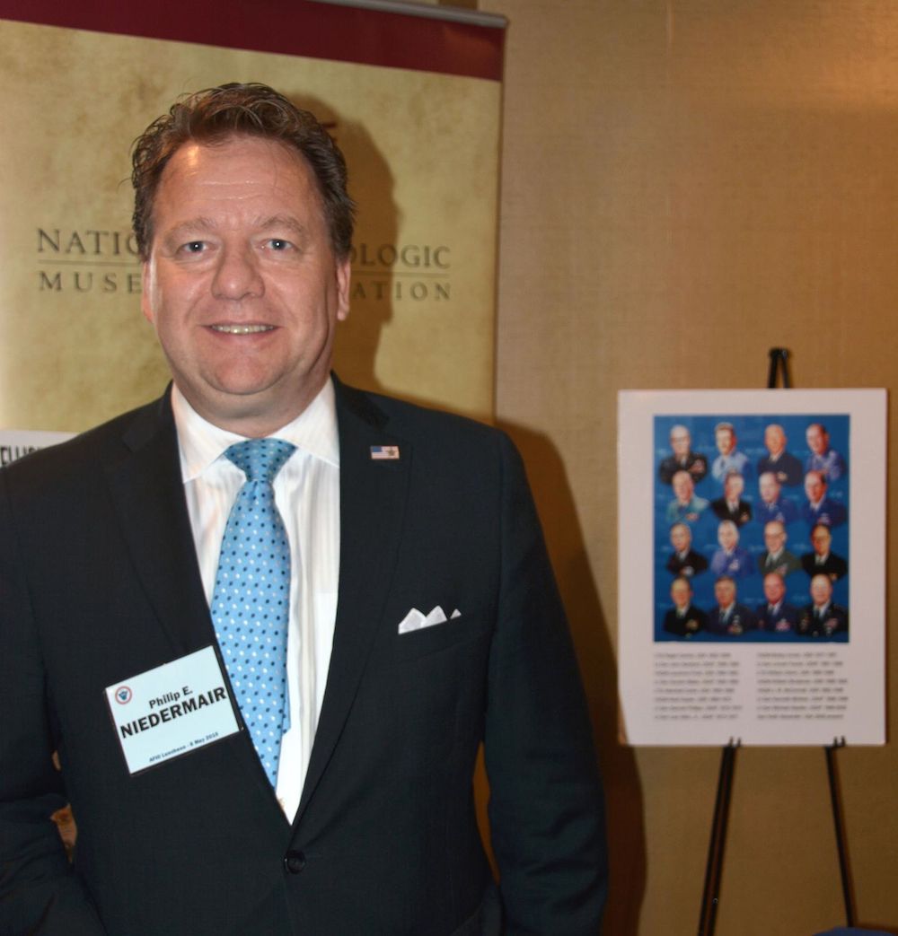 Visiting the NCMF booth at the 2015 AFIO Spring Luncheon