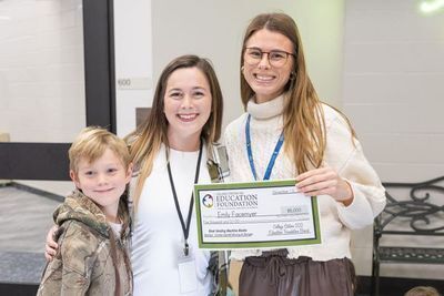 Education Foundation donor shaking hands with teacher