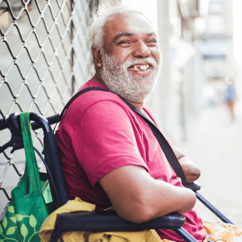 Man in Wheelchair Smiling