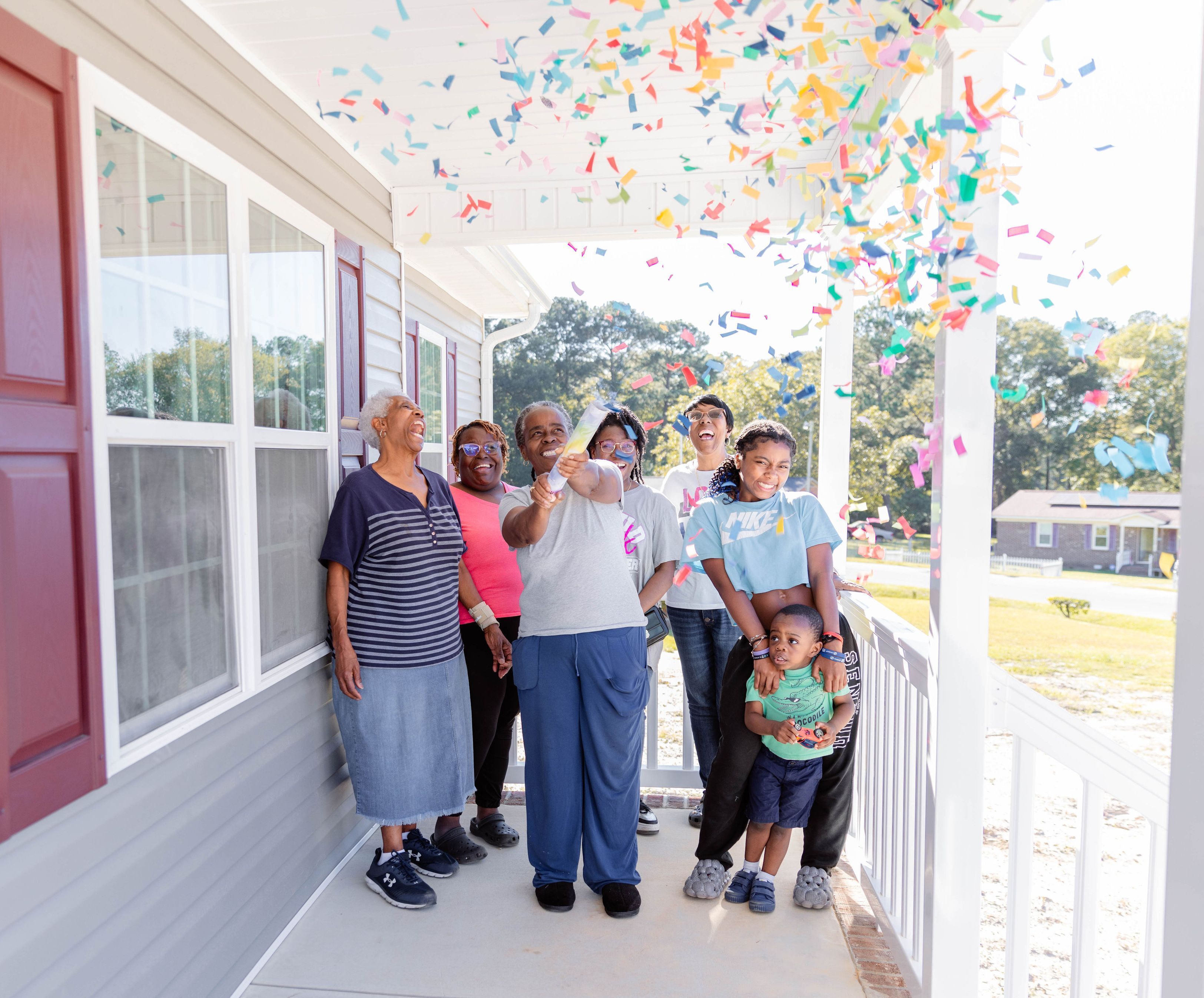 Homeowner celebrates closing with confetti