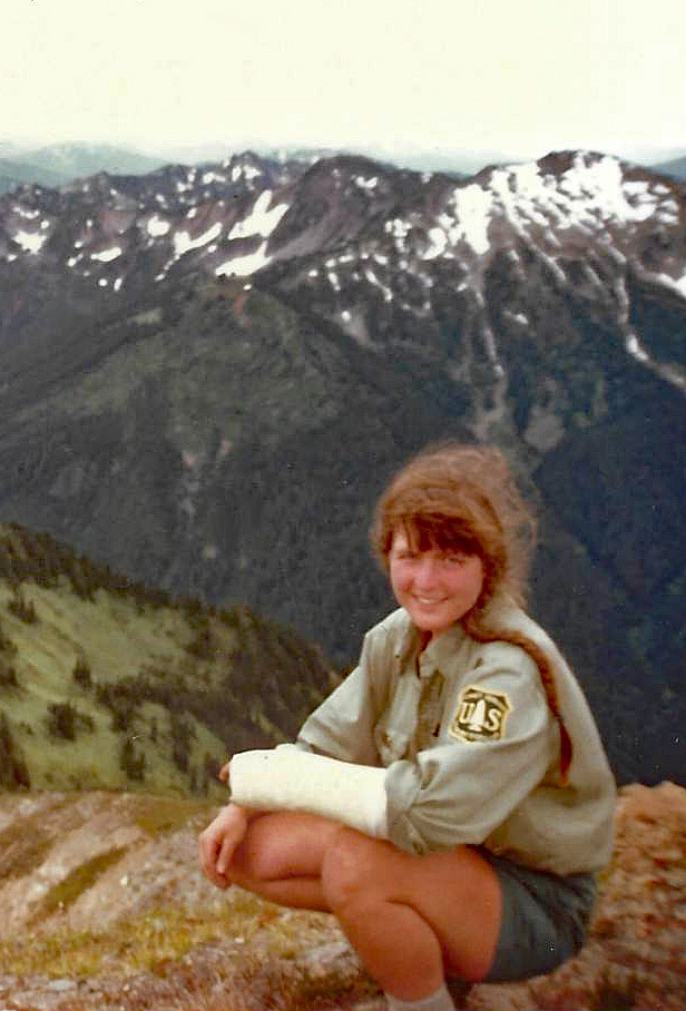 An image of Lisa Therrell on White Pass in her youth dressed in her uniform and wearing an arm cast