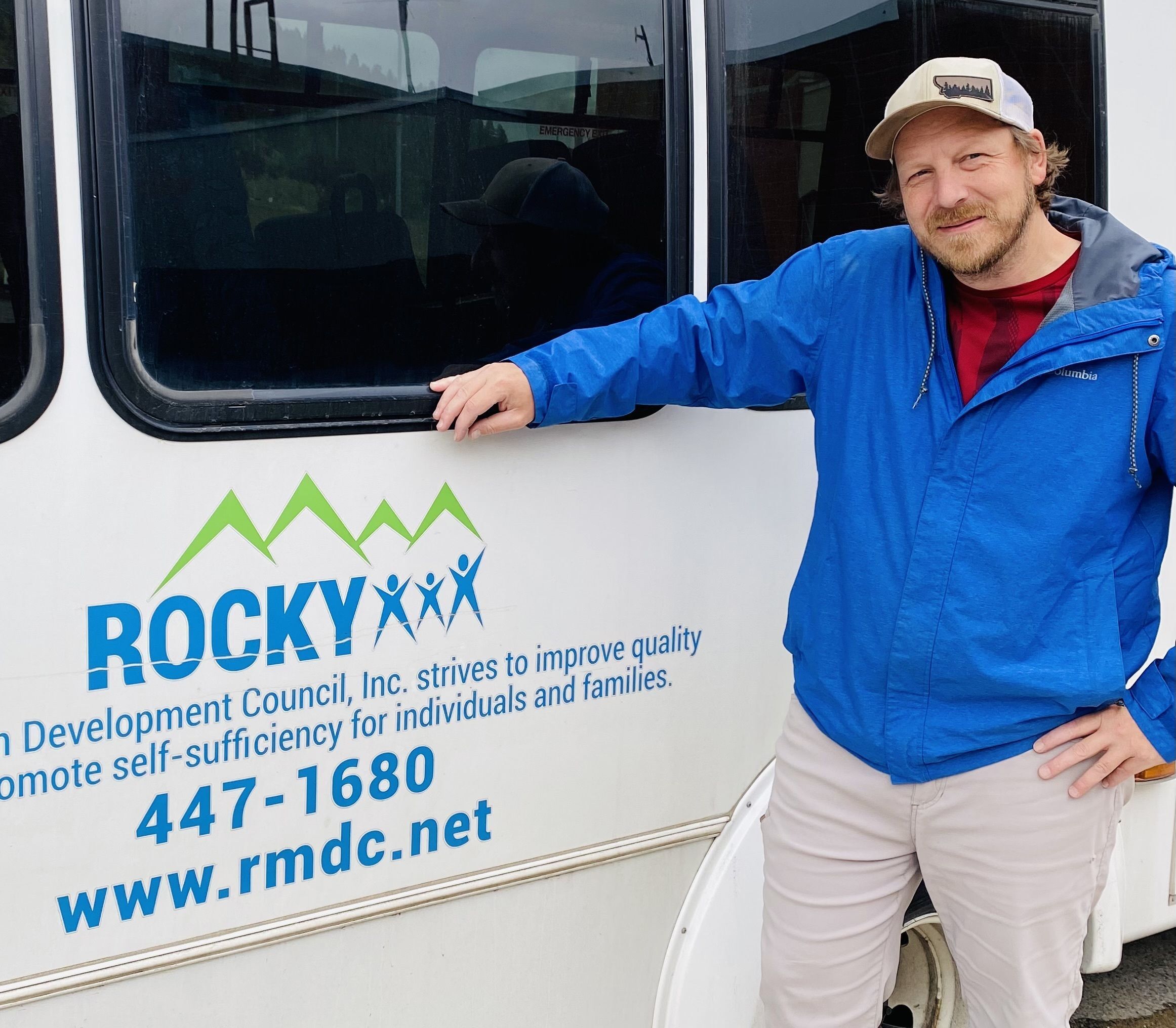 Pictured: Rocky's two bus drivers in front of the RMDC Senior Bus.