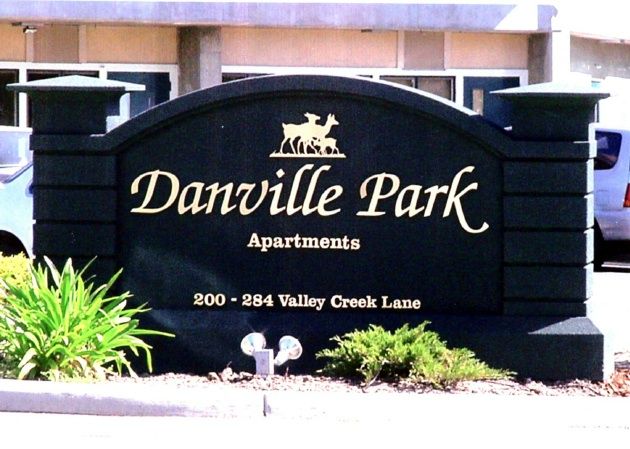 K20042 - Entrance Sign for Danville Park Apartments, Black & Gold, with Family of Deer 