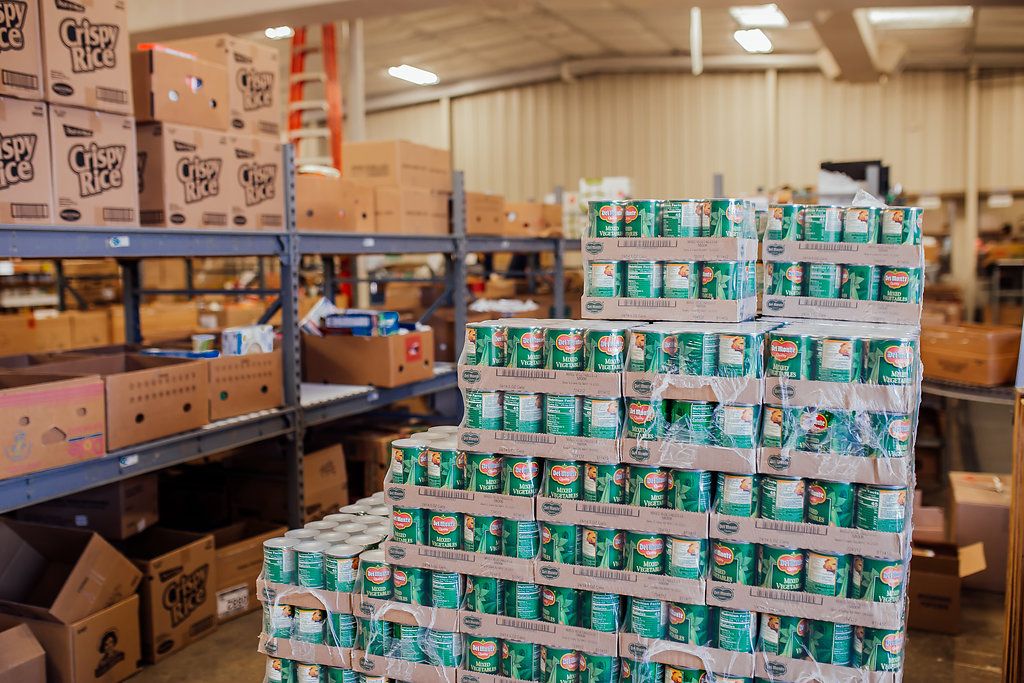 Pallet of vegetable cans.