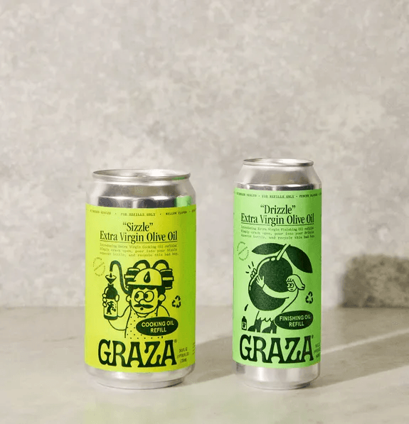 Graza Sizzle and Drizzle extra virgin olive oil refill cans with bold green labels, showcasing playful packaging design ideas for pantry brands.