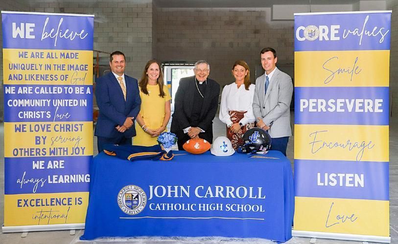 On a Sept. 16, 2025 visit to John Carroll High School, Bishop Gerald Barbarito, center, views the new athletic. With him are Mickey Groody, athletic director, Corey Heroux, president, Katie Kervi, assistant superintendent, and Michael Bryk, principal.