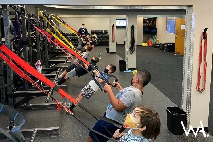 young athletes using resistance bands