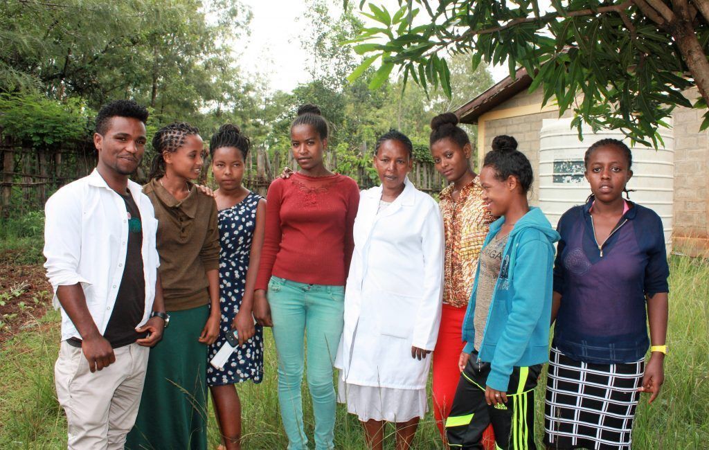 Barkot and some top classmates and a teacher at her school