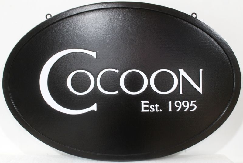 Q25040B - Carved Sign for "Cocoon"