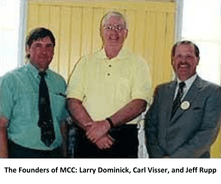 [Image description: Three men standing in a row, smiling. From left to right, these men are the MCC Founding Fathers: Larry Dominick, Carl Visser, and Jeff Rupp.] 
