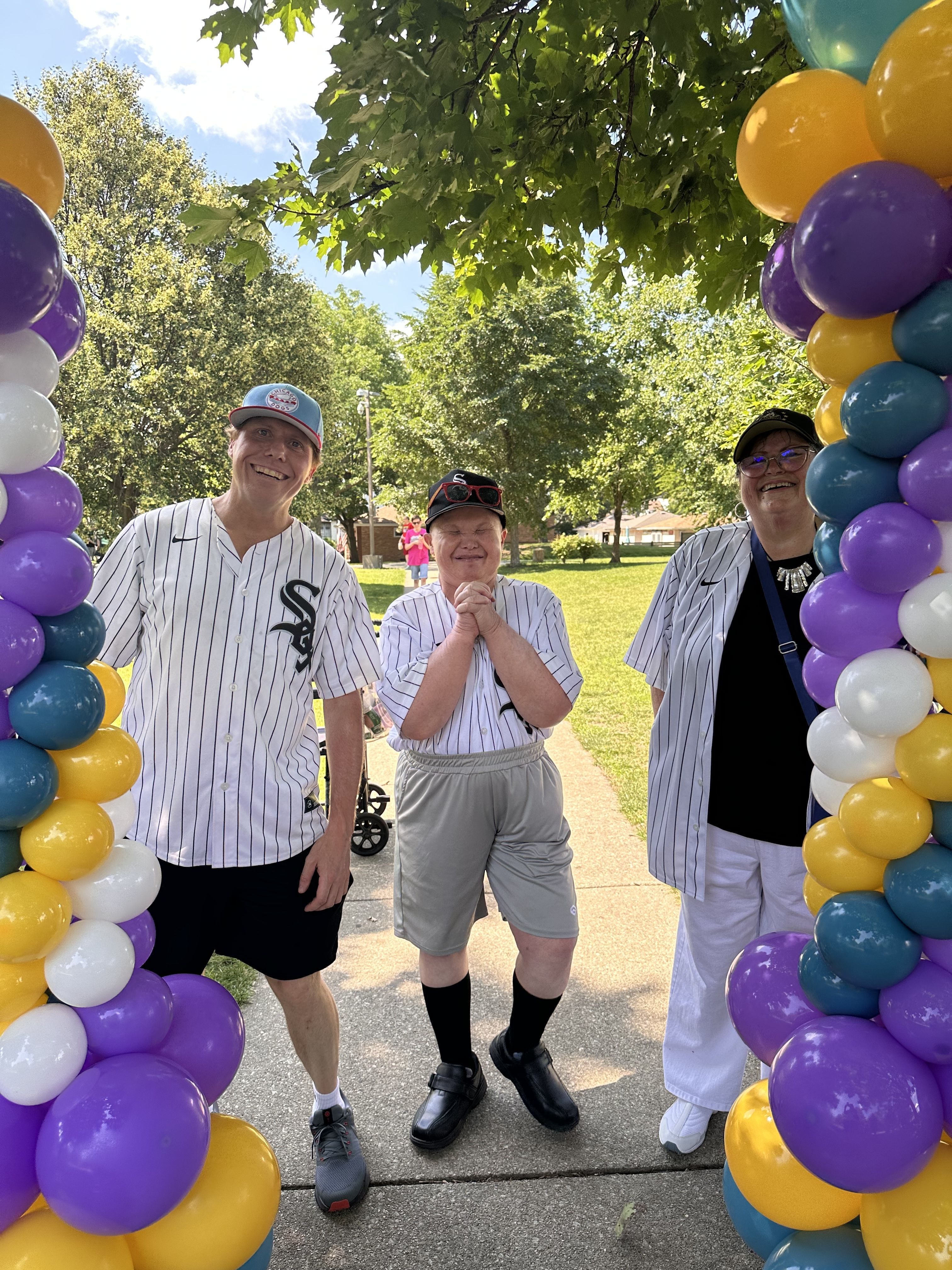 Cover of the 2025 Fall Spotlight featuring a Caucasian male with disabilities and his brother and aunt