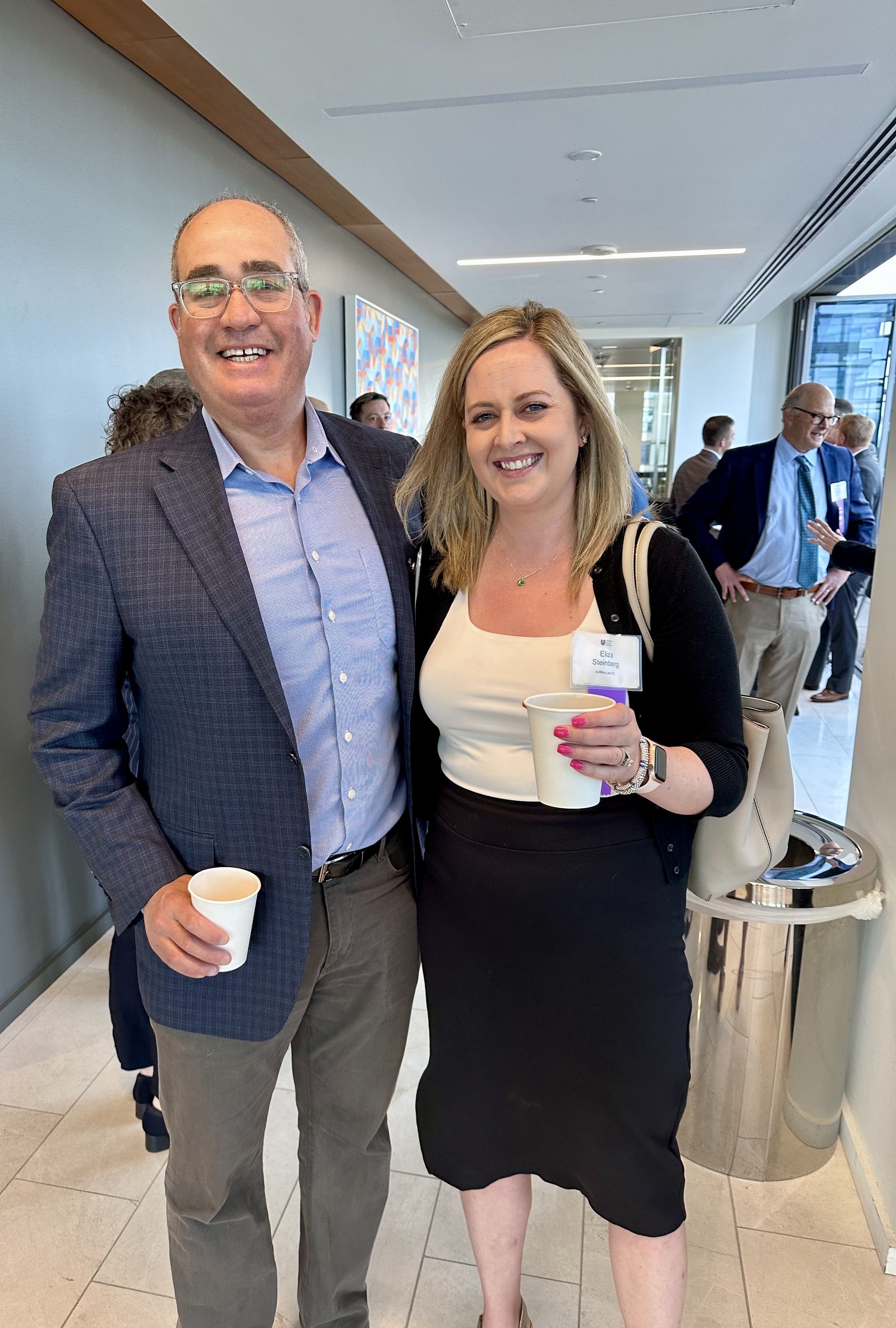 Jon Goldberg poses with fellow CJI board member Eliza Steinberg at CJI's Member Breakfast held June 14, 2023.