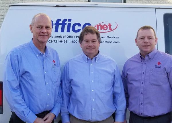 OfficeNet owner Russ Hoetfelker with Mark Miller and Paul McKinney of Eakes