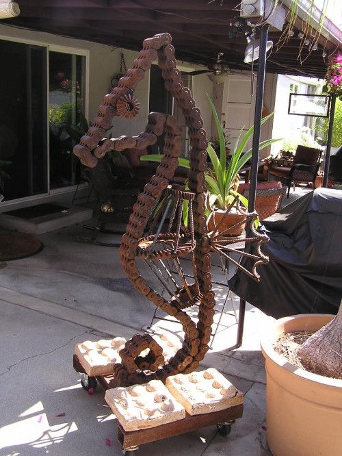 Large Sea Horse,Metal-Scrap fork lift chain, large gears and scrap metal; 5' 8" H; 36" D; 30" W; Approx. 400 lbs