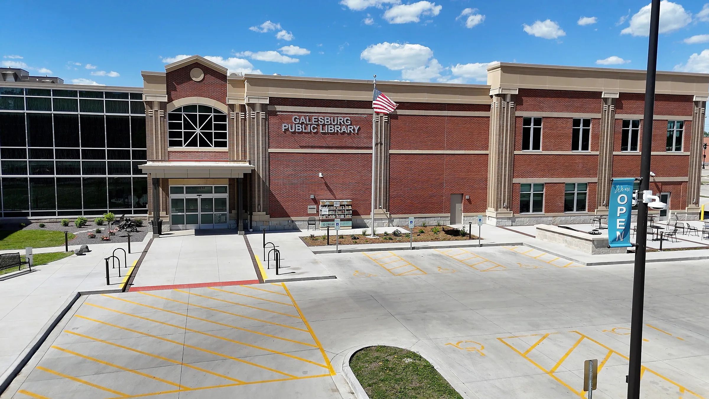 Library director toasting at grand opening