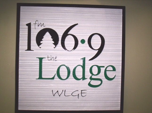 SA28589 - Sign for "106.9 Lodge" Radio Station with Radio Frequency