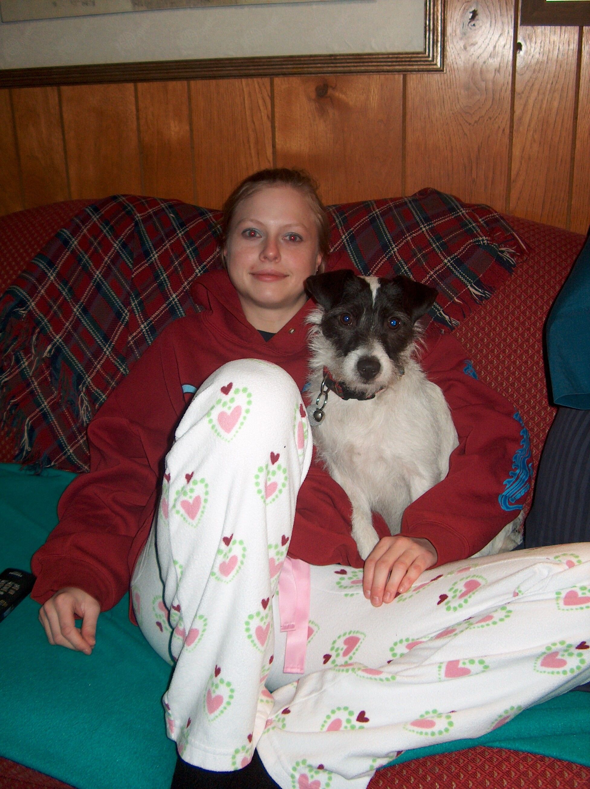 Melissa snuggling with her dog Bentley