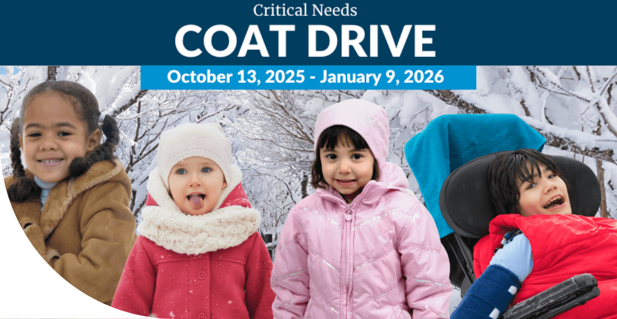 girls in winter coats with snow and trees in background