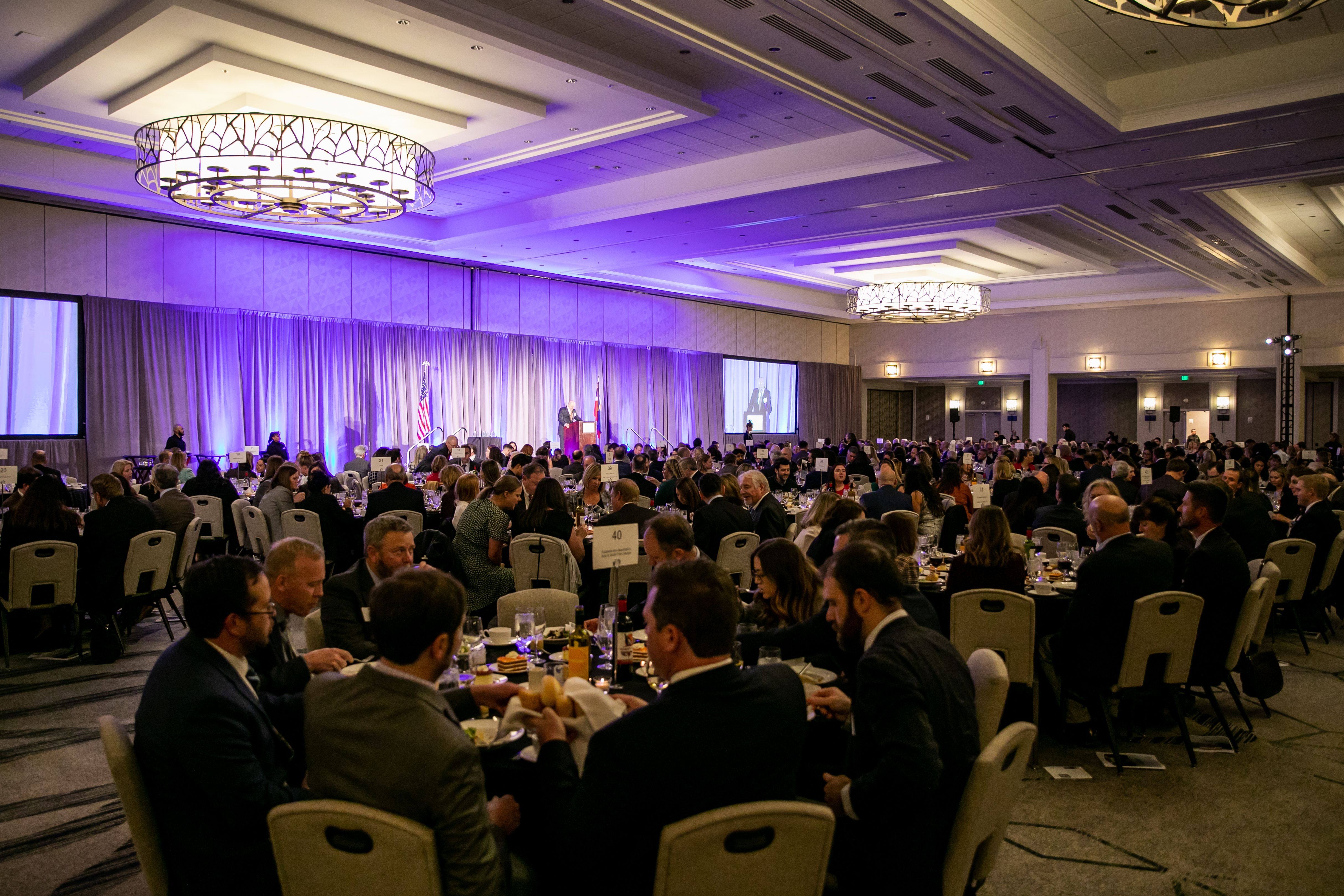 Guests chat at their tables during CJI's Judicial Excellence for Colorado Gala Dinner in November 2022
