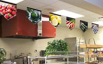 6 food banners hanging in school café serving line, school banners, market style, small banners